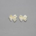 decorative bra bows AB-1 ivory from Bra-Makers Supply set of 2 shown