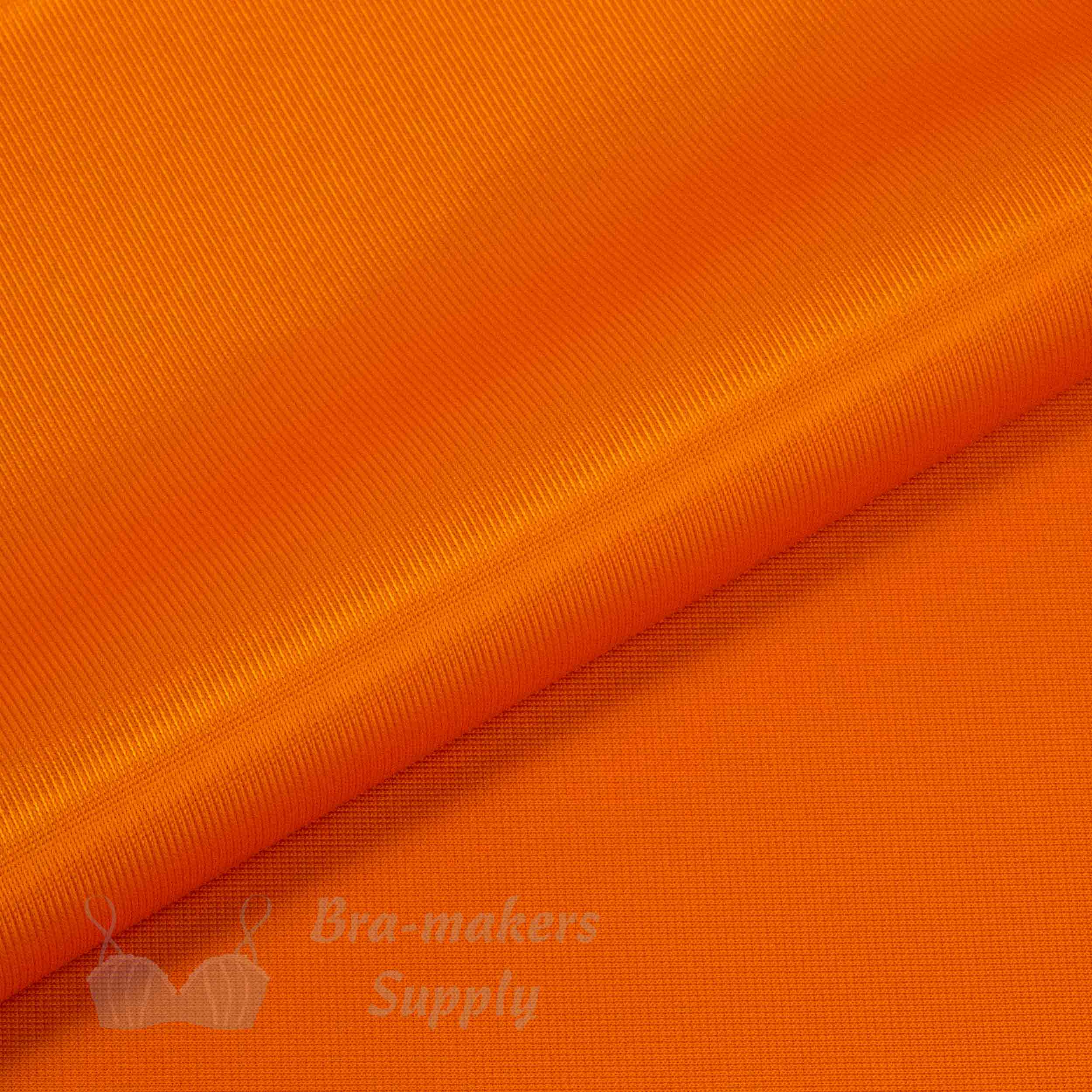 duoplex reversible low stretch bra cup fabric FJ-6 orange or low stretch bra cup fabric orange popsicle Pantone 17-1350 from Bra-Makers Supply folded