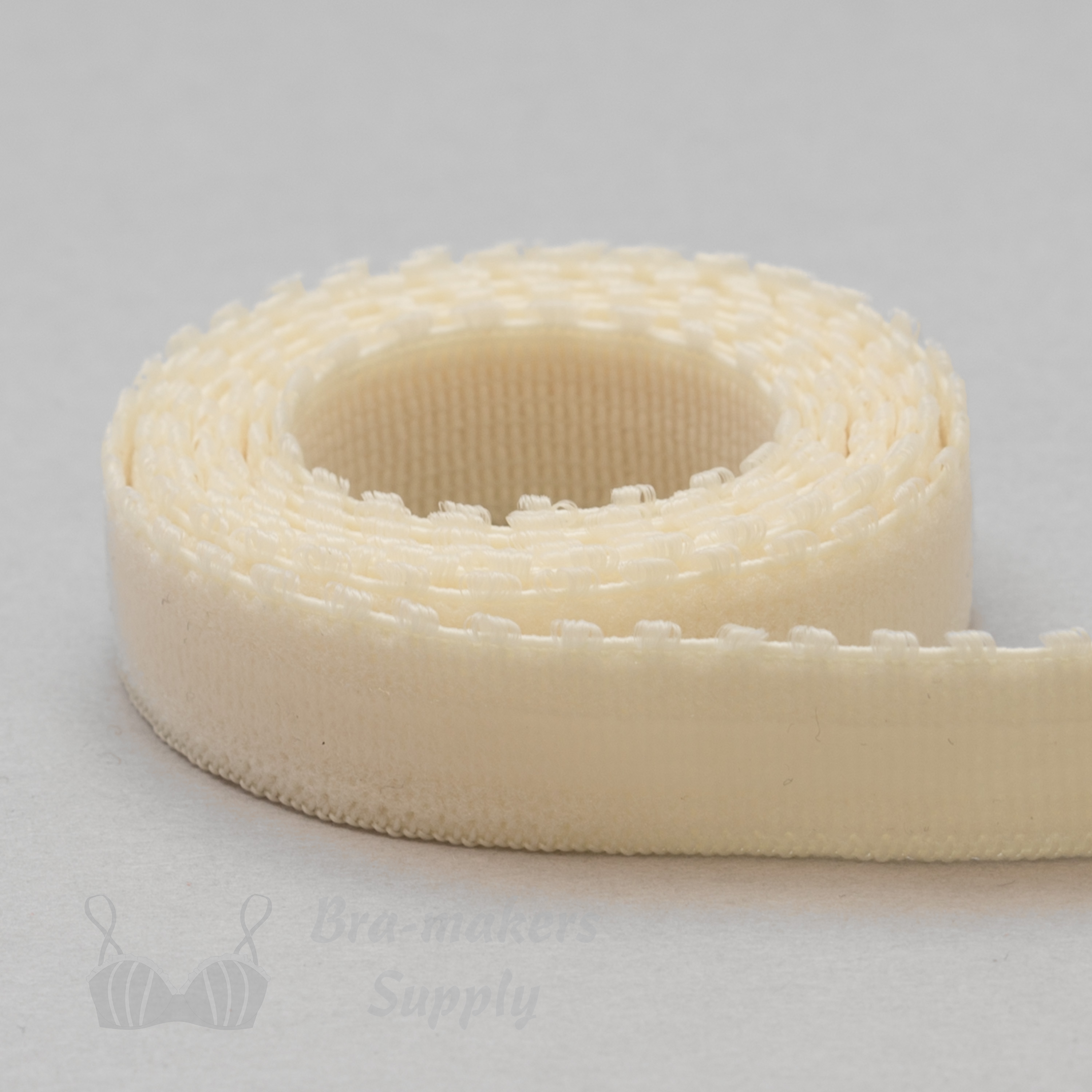 half inch or 12 mm silicone gripper elastic EG-4 ivory from Bra-Makers Supply Hamilton 1 metre roll shown