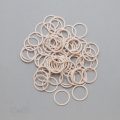 five eighths inch 16mm RM-600 R peach nylon coated metal rings sliders or linen Pantone 12-1008 from Bra-Makers Supply 100 rings shown