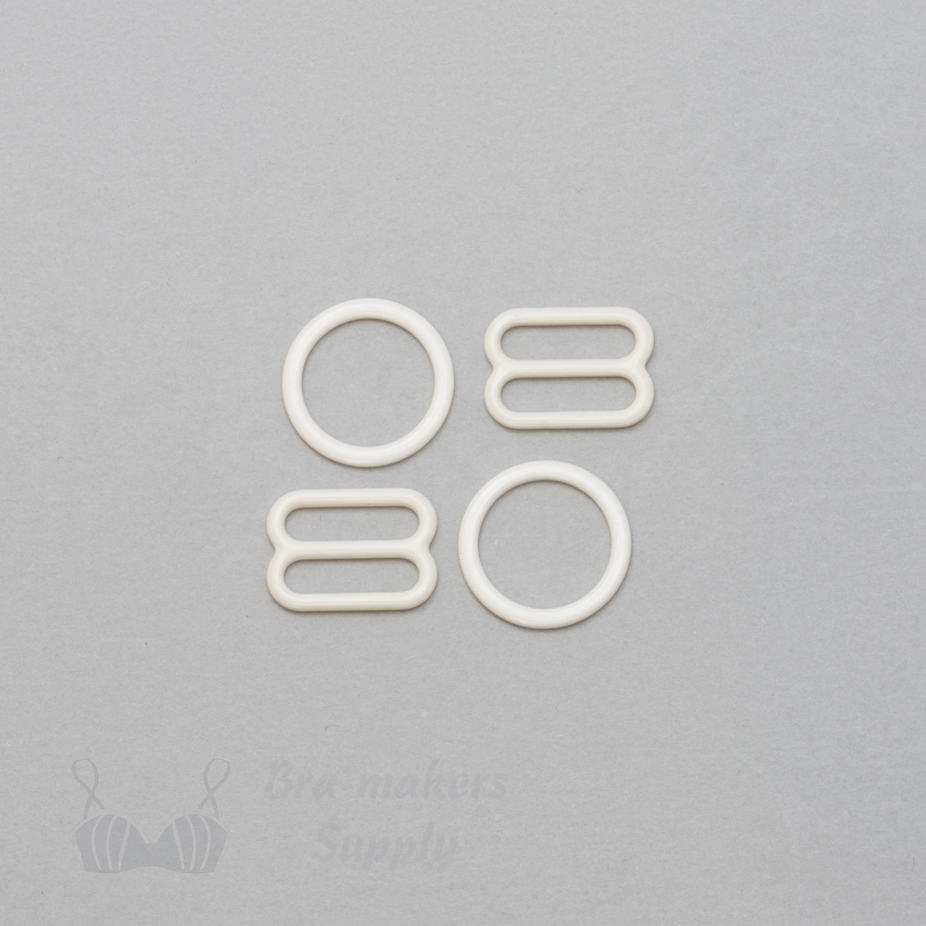 half inch 12mm RM-4 ivory nylon coated metal rings sliders or winter white Pantone 11-0507 from Bra-Makers Supply 2 sliders 2 rings shown