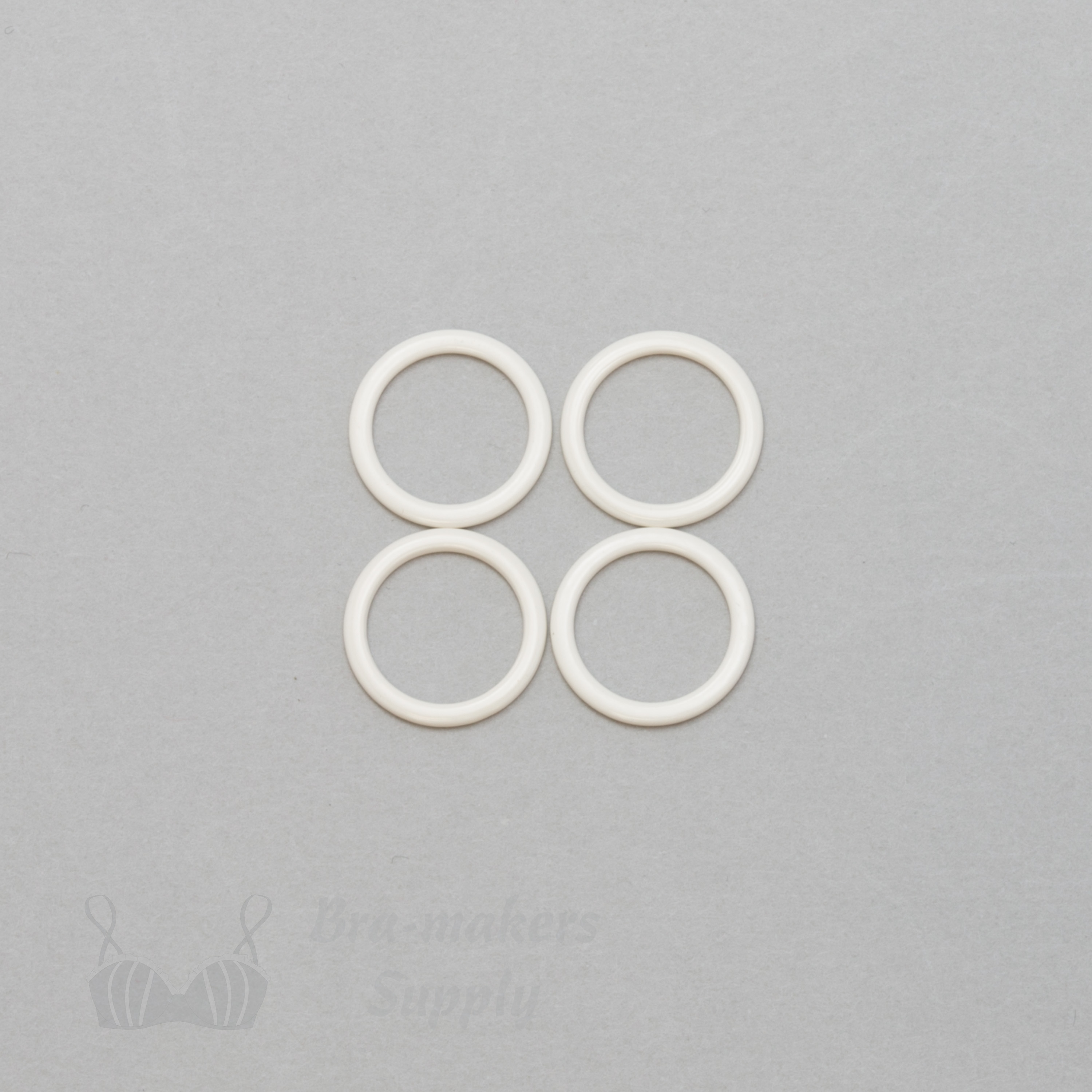 half inch 12mm RM-40 R PK4 ivory nylon coated metal rings sliders or winter white Pantone 11-0507 from Bra-Makers Supply 4 rings shown