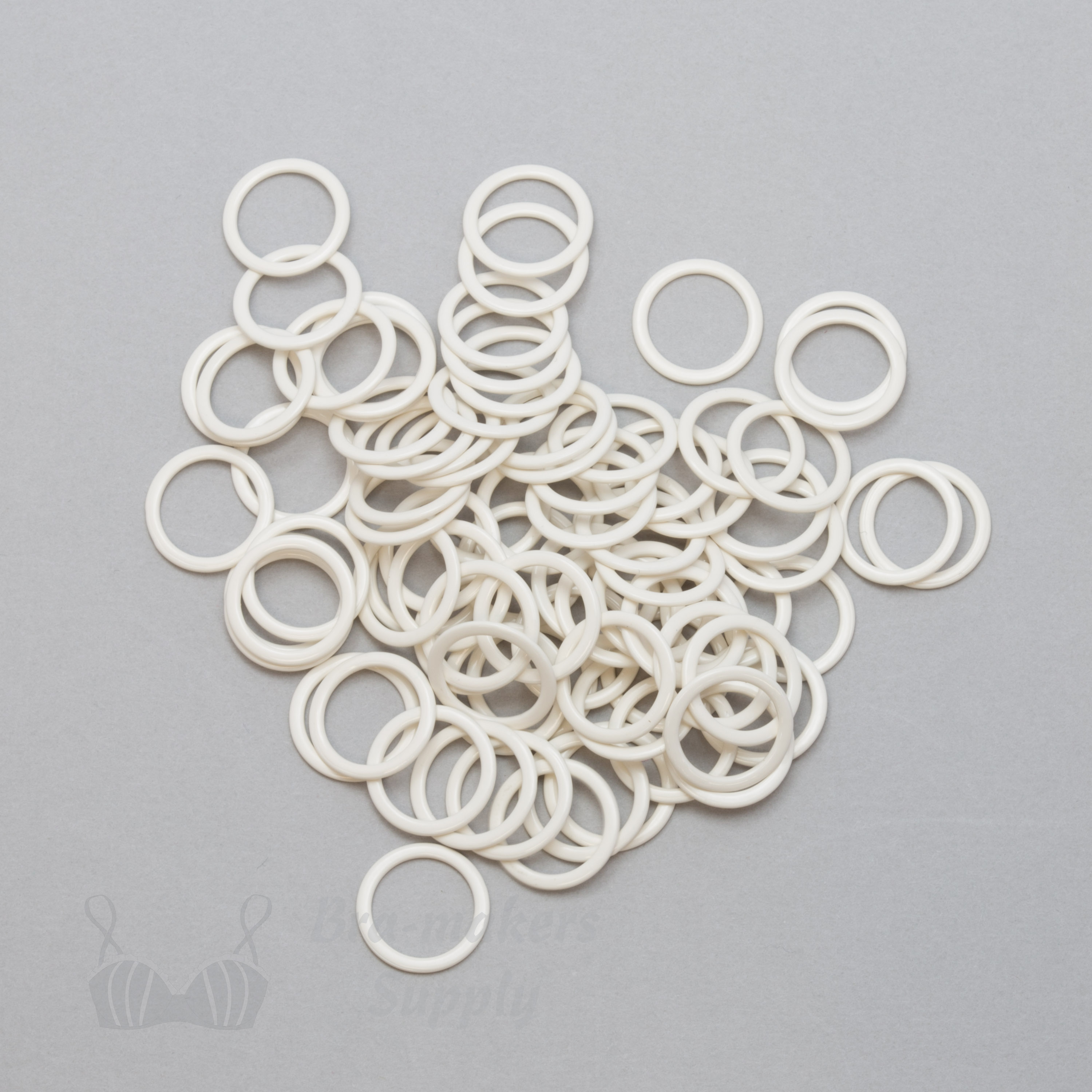 half inch 12mm RM-400 R ivory nylon coated metal rings sliders or winter white Pantone 11-0507 from Bra-Makers Supply 100 rings shown