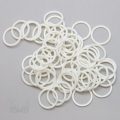 three quarters inch 19mm plastic sliders rings R-600 R dye-able white from Bra-Makers Supply bulk bag of 100 rings shown