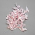 decorative bra bows AB-100 pink from Bra-Makers Supply bulk bag of 100 shown