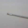 heat shrink spiral boning cover BHS-25 from Bra-Makers Supply on boning shown