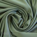 wickable anti-bacterial stretch fabric FW-4 moss green from Bra-Makers Supply twirl shown