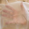 matte glissonette sheer stretch fabric FT-17 beige from Bra-Makers Supply hand shown