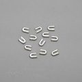 spiral boning caps or spiral boning tips BS-12 from Bra-Makers Supply package of 12 top view shown