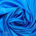 stretch satin mirror satin spandex FR-51 peacock blue from Bra-Makers Supply twirl shown