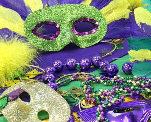 https://www.braandcorsetsupplies.com/wp-content/uploads/2017/02/Mardi-Gras-masks-and-beads-e1488284841898-495x400.jpg