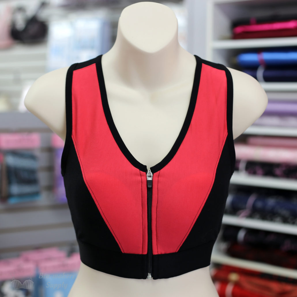 https://www.braandcorsetsupplies.com/wp-content/uploads/Coral-and-Black-Allie-Sports-Bra-with-zipper-Bra-makers-Supply-1030x1030.jpg